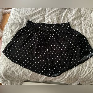 Small black polka dotted skirt